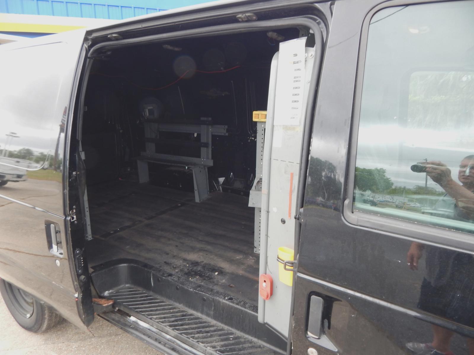 2014 Black Ford E-Series Van (1FTNE1EW6ED) with an V8 engine, Automatic transmission, located at 3120 W Tennessee St, Tallahassee, FL, 32304-1002, (850) 575-6702, 30.458841, -84.349648 - Used Car Supermarket is proud to present you with this loaded immaculate 2014 Ford E150 Econoline Work Van. Used Car Supermarket prides itself in offering you the finest pre-owned vehicle in Tallahassee. Used Car Supermarket has been locally family owned and operated for over 48 years. Our E150 Work - Photo #8